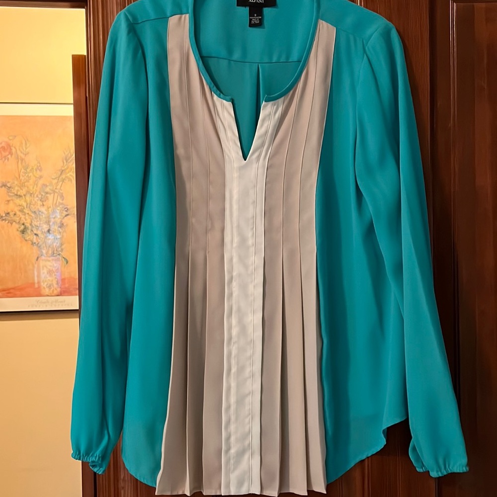 Turquoise cream and tan blouse